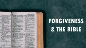 Open Bible featuring text about forgiveness, with the title 'Forgiveness & The Bible' displayed beside it.