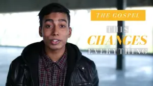 Young man speaking confidently, wearing a leather jacket and plaid shirt, with text overlay about the gospel's transformative impact.