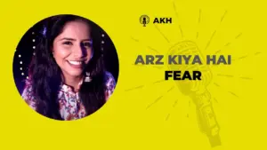 Smiling woman with long hair against a bright yellow background, captioned "ARZ KIYA HAI FEAR" and a microphone graphic.