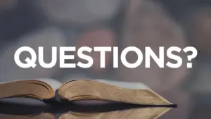 Open book with the word "QUESTIONS?" prominently displayed, inviting inquiries and engagement.