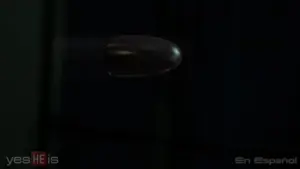 A close-up of a bullet in motion against a dark background, showcasing speed and precision.