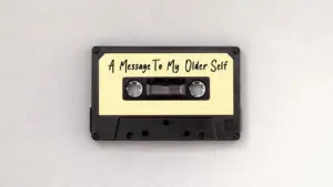 Retro cassette tape labeled "A Message To My Older Self" on a plain background, evoking nostalgia and personal reflection.