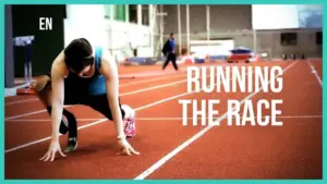 Athlete in starting position on track, preparing for a race, emphasizing determination and athleticism.