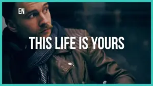 Man looking thoughtfully in a stylish leather jacket with the text "This life is yours" prominently displayed.