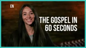 Smiling woman presenting "The Gospel in 60 Seconds" on a vibrant backdrop, conveying a message of faith and inspiration.