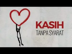 A person holding a large heart with the words "KASIH TANPA SYARAT" in bold, vibrant lettering against a textured backdrop.