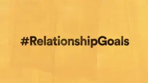 Yellow background featuring bold text that reads #RelationshipGoals, conveying love and partnership themes.