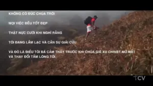 A hiker exploring a rugged landscape with inspirational text overlay in Vietnamese about perseverance and self-discovery.