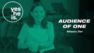 Smiling woman sitting in a studio, promoting "Audience of One" by Missio Dei with a vibrant green background.