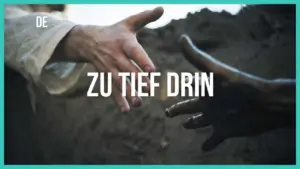 Two hands reaching out towards each other, one above dirt, symbolizing connection and hope against a blurred background.