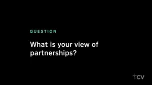 Question about partnerships displayed on a black background with green and white text, prompting viewer engagement.