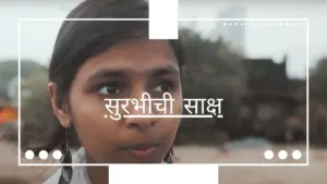 Close-up of a girl speaking passionately with a blurred background and text overlay in Hindi promoting an important message.