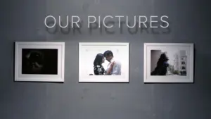 Three framed photos on a wall, showcasing moments of love and connection, with the text "Our Pictures" above.