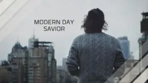 Person overlooking a city skyline, embodying the concept of a "modern day savior" in a contemplative pose.