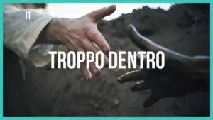 Hands reaching out in a dramatic scene, with the text "TROPO DENTRO" prominently displayed.