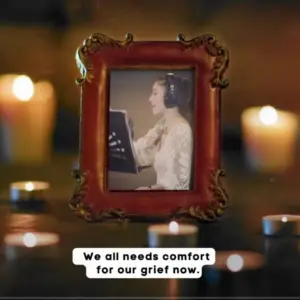 Vintage photo of a woman singing in front of lit candles, symbolizing comfort and healing during grief.