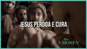 Scene from "The Chosen" featuring characters with the text "Jesus Perdoa e Cura" highlighting themes of forgiveness and healing.