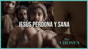 Scene from "The Chosen" featuring characters emphasizing the message "Jesús perdona y sana" with a dramatic expression.