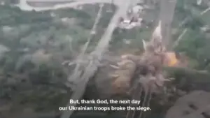 Aerial view of Ukrainian troops advancing through a landscape with smoke rising, symbolizing breaking a siege.