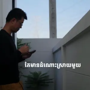 Person writing on a notepad in a bright indoor space with plants, emphasizing creativity and inspiration.