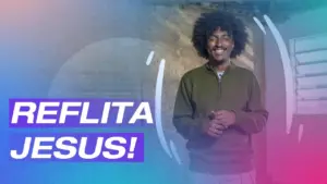 Smiling man with curly hair promoting a positive message, "Refleita Jesus!" in a vibrant, colorful background.