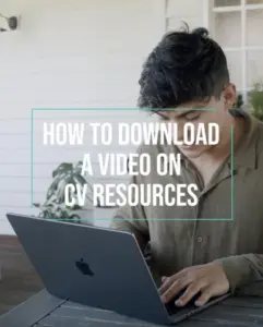 Person using a laptop to learn how to download CV resources video, with a casual indoor setting.