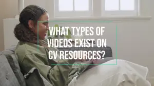 Woman sitting on a couch, engaging with a laptop, exploring video resources for CV building and job applications.