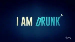 Text graphic reading "I AM DRUNK" with a colorful design and a cocktail glass element, set against a dark blue background.