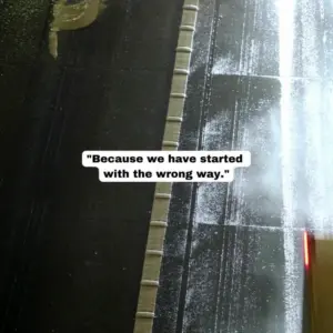 Aerial view of a wet road with spray, featuring a text overlay about starting the wrong way in a project or journey.