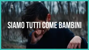 A child covering their mouth, surrounded by nature, with the phrase "Siamo tutti come bambini" in bold text.