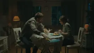 Couple sharing a tense dinner at a dimly lit table, emphasizing their emotional connection and conversation.