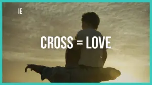 A parent and child silhouette against a sunset, symbolizing love with the text "CROSS = LOVE" prominently displayed.