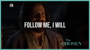 Scene from "The Chosen" featuring a man inviting others to follow him, with focused lighting highlighting his expression.