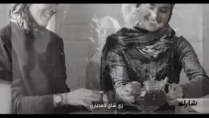 Two women enjoying tea together in a cozy setting, highlighting cultural connection and friendship.