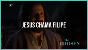 Scene from "The Chosen" featuring Jesus calling Filipe, with a warm, inviting expression in a darkened setting.