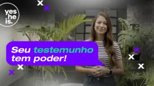 Smiling woman in a striped shirt stands in a stylish room with plants, emphasizing the message about empowerment.