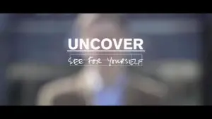 Blurry figure in the background with the text "UNcover" and "See for yourself" emphasizing discovery and exploration.