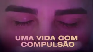 Close-up of closed eyes with bold text "Uma Vida Com Compulsão" highlighting themes of introspection and mental health.