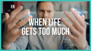 Man looking stressed with glowing energy in his hands, conveying the message "When life gets too much."