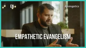 Man discussing "Empathetic Evangelism" in a modern, well-lit space, highlighting thoughtful engagement.