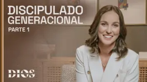 Smiling woman in a blazer discussing generational discipleship in a modern setting, with soft lighting and neutral tones.