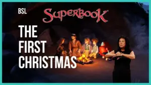 Superbook logo with characters gathered around a campfire, depicting a scene from "The First Christmas."