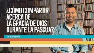 Man smiling against a backdrop of bookshelves, promoting a discussion on sharing God's grace during Easter.