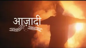 Silhouette of a person with arms outstretched against a fiery background, featuring the word "आजादी" in artistic script.