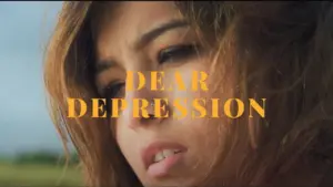 Close-up of a woman reflecting thoughtfully with the words "Dear Depression" prominently displayed. Empowering mental health message.